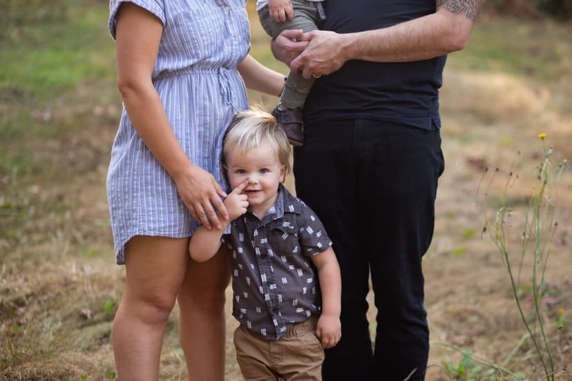 a young boy with his parents
