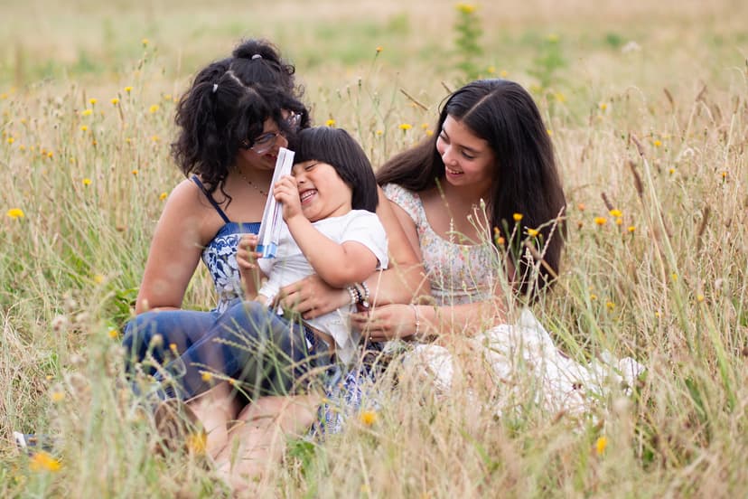 a young boy with his sisters